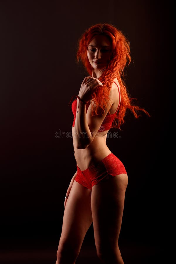 Tesauro Medicina servir Redhead Cabaret Dancer in Lingerie on a Dark Background, Free Space for  Your Text Stock Image - Image of girl, beautiful: 206649275