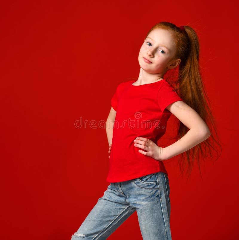 Pensive Freckled Girl With Ginger Hair Wearing Orange T Shirt Stock