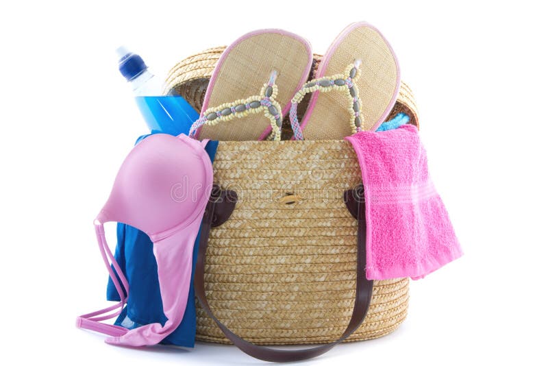 Reed Beach Bag Filled with Bikini, Slippers, Water Etc Stock Photo ...