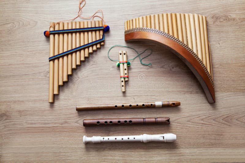 Set of ethnic wooden flutes closeup. Set of ethnic wooden flutes closeup