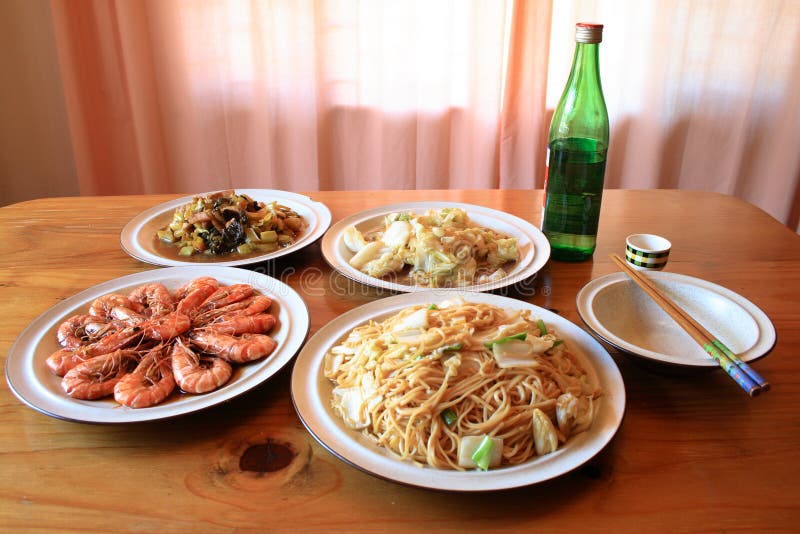 A table full of chinese dishes. A table full of chinese dishes