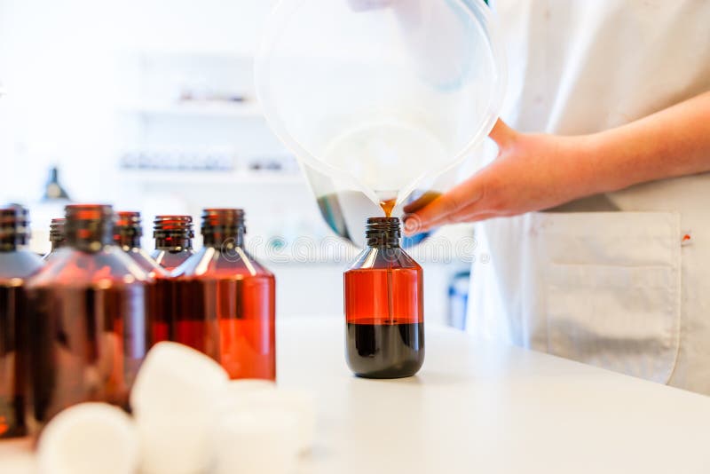 Refilling or Cough Syrup at a Pharmacy Stock Image Image of liquid