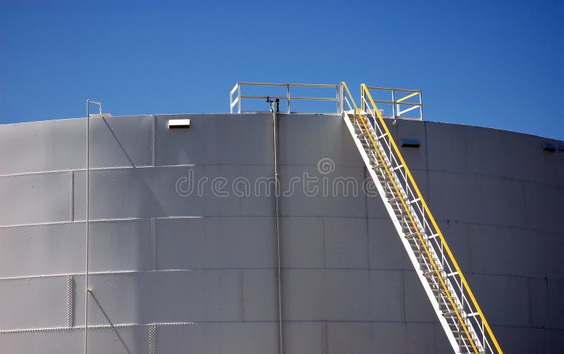 Refinery ladder and tanks stock image. Image of pipe, construction ...