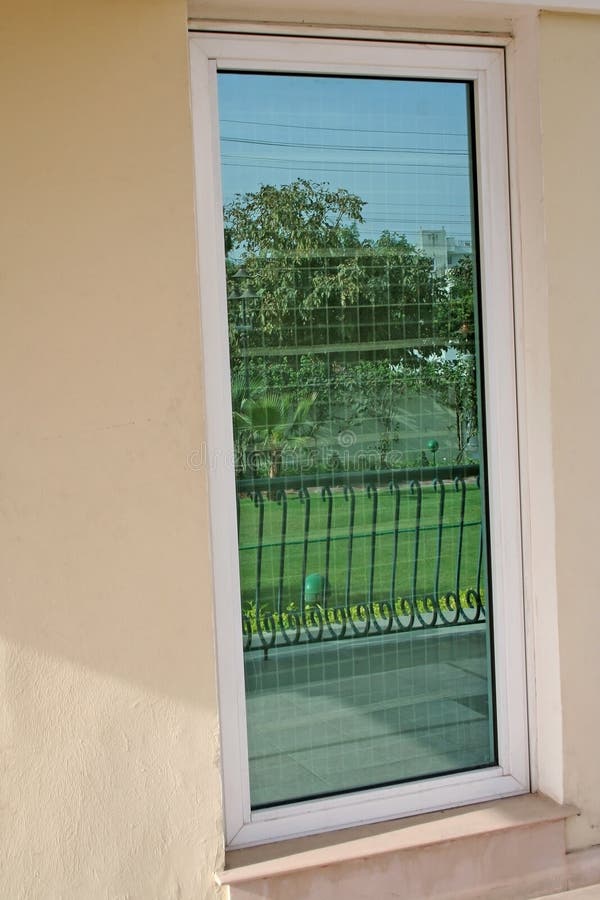 Reflected garden in window