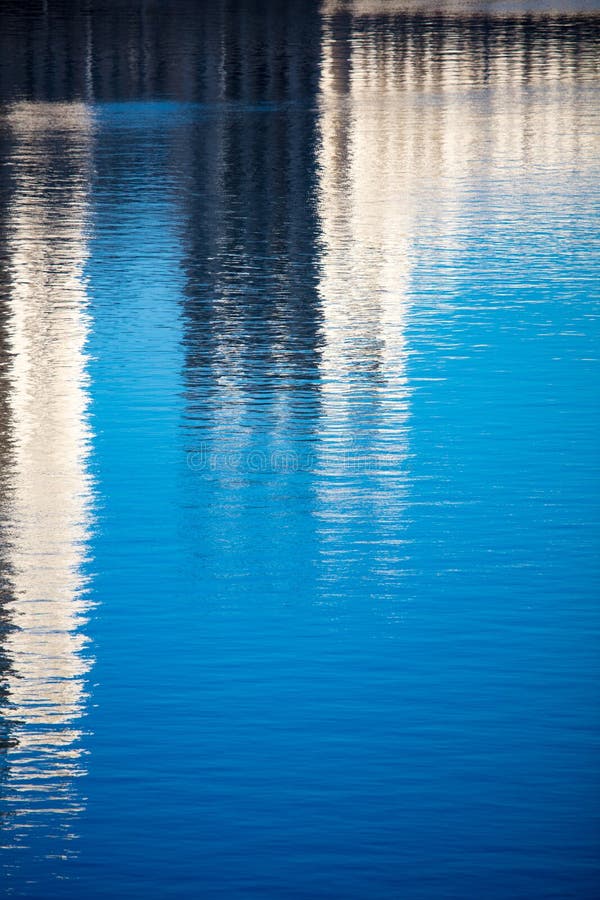Reflection of a building on the smooth surface of water as a background royalty free stock photo Reflection of a building on the smooth surface of water as a background royalty free stock photo