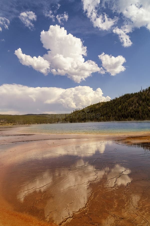 Reflection of clouds in Grand Prismatic spring in the Midway Geyser Basin in Yellowstone National Park