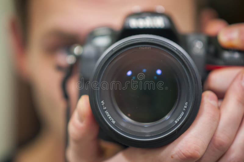 Reflection Of Man In Mirror While Photographing with nikkor 85mm 1.8