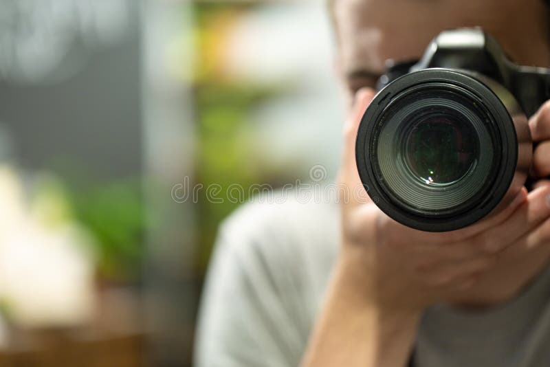 Reflection in the Mirror of a Man with a Camera Stock Photo Image of