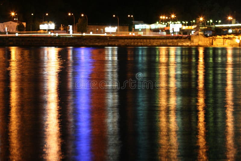 River With A Reflection Of The Lights Of The Night City. Stock Image
