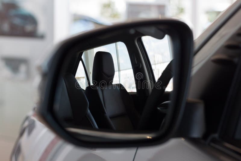 Reflection in Side Mirror of the Car Interior. Modern Transportation