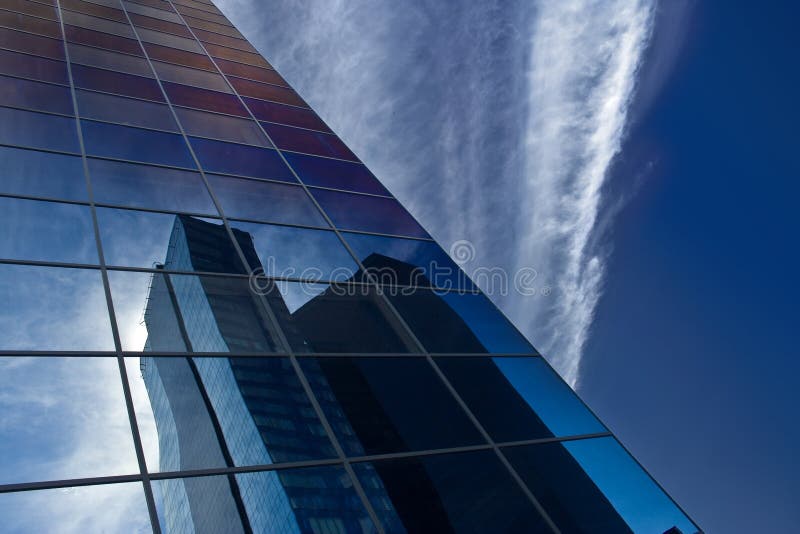 Reflection of skyscraper in windows of other office building. Window color reflection background stock images, royalty-free photos and pictures