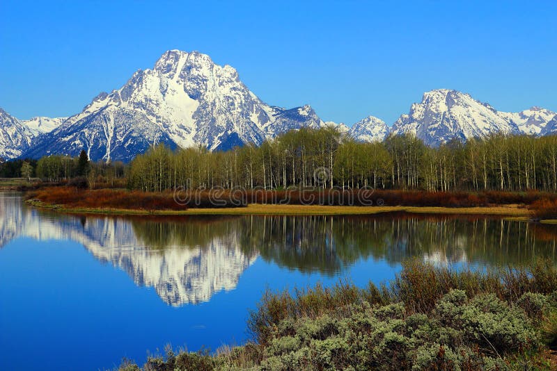 Grand Teton National Park, Reflection of Snowy Mount Moran and Rocky Mountains in Oxbow Bend of the Snake River in Wyoming, USA