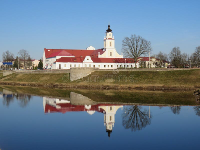 Reflection of the Town Hall building in the river in Orsha