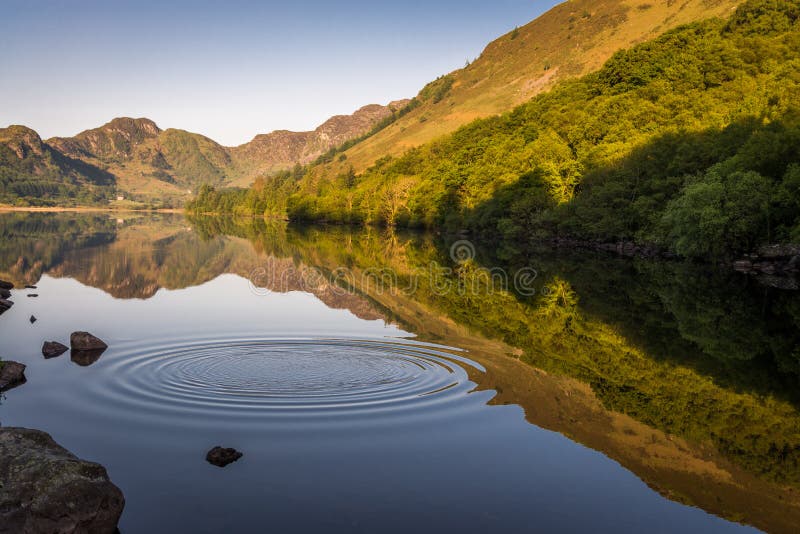 Reflections on Llyn Crafnant with ripples stock photos