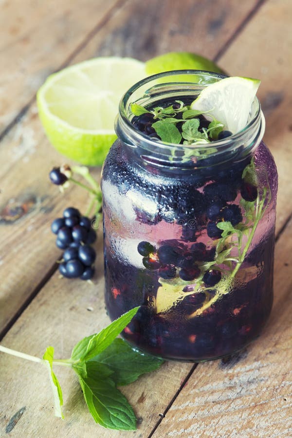 Refreshing blackberry lemonade with mint royalty free stock photos