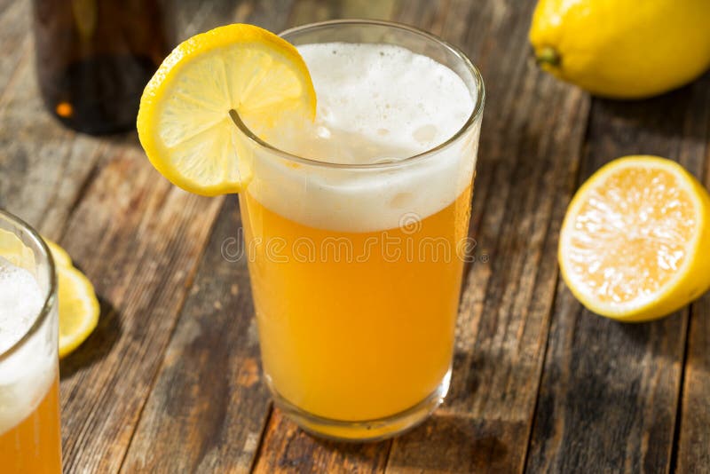 Refreshing Lemon Beer Shandy stock images