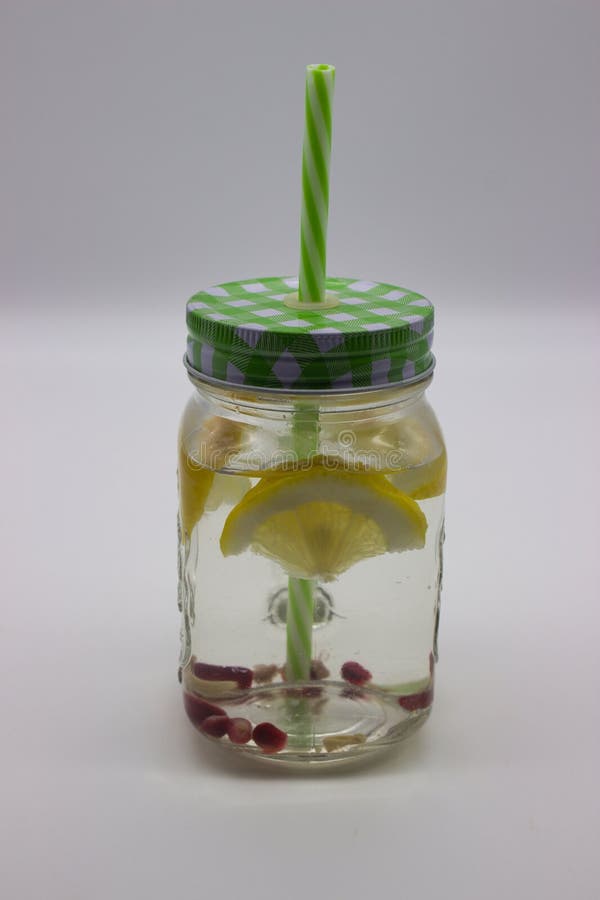 Refreshing Lemon Water in a Mason Jar stock photos