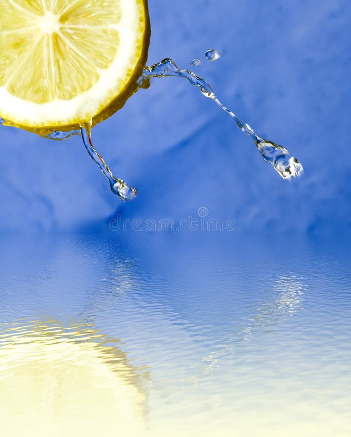 Refreshing lemon and water reflection