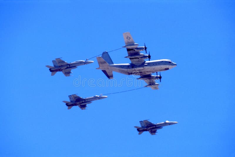 Refueling the Plane. Filling Tank and Gun. Fuel Supply through a Hose