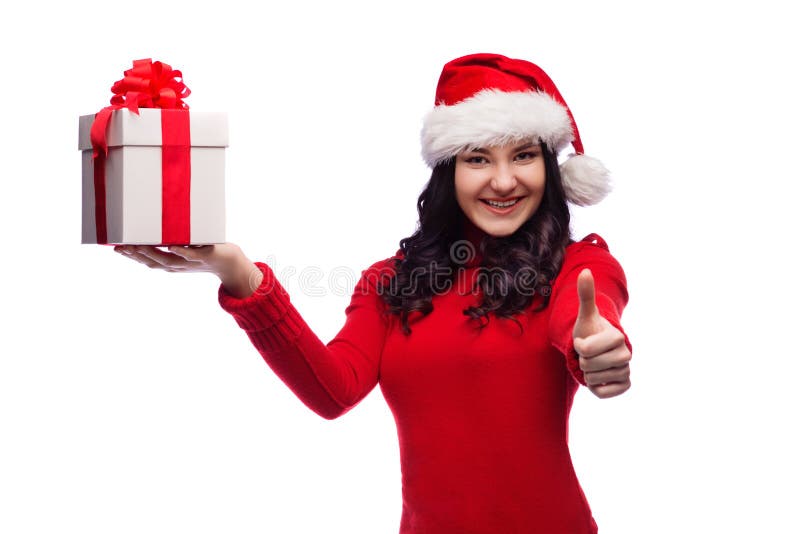 Regalo aislado sombrero de la Navidad del control de la mujer de Papá Noel de la Navidad foto de archivo libre de regalías Regalo aislado sombrero de la Navidad del control de la mujer de Papá Noel de la Navidad foto de archivo libre de regalías