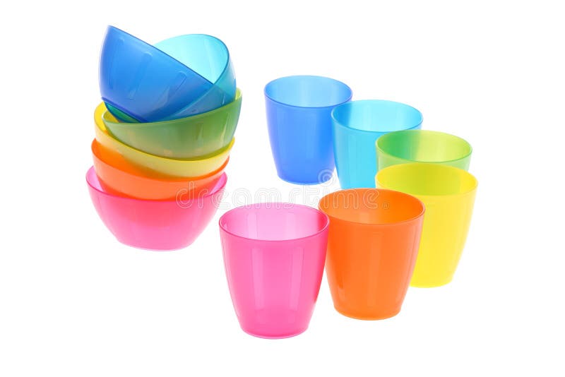 Six multicolored stacked bowls and glasses in shape of an arc isolated on pure white background. Six multicolored stacked bowls and glasses in shape of an arc isolated on pure white background