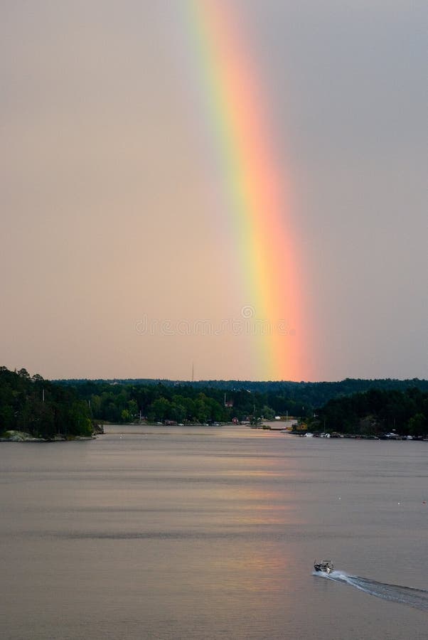 August Weather - Intensive Rainbow Over the Baltic Sea at (Sweden). August Weather - Intensive Rainbow Over the Baltic Sea at (Sweden)