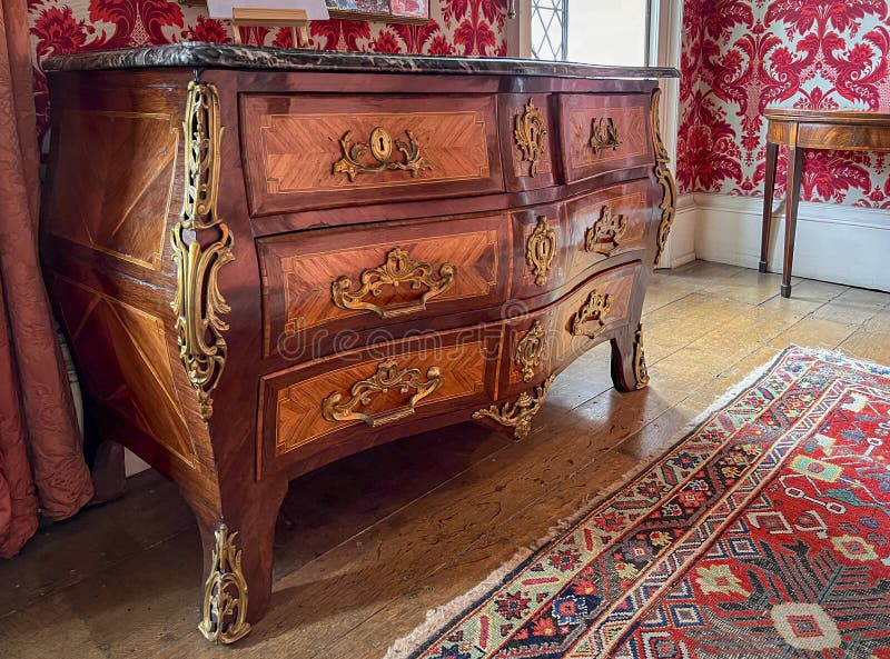 Louis XV style 18th century rosewood chest of drawers with marble top. Louis XV style 18th century rosewood chest of drawers with marble top