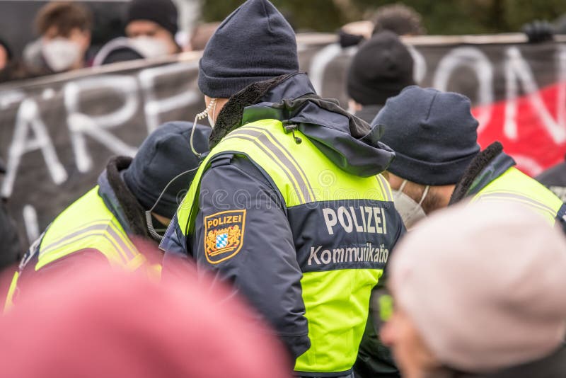 Police communication officer at an anti-corona demonstration for peace freedom self-determination in Regensburg, Germany