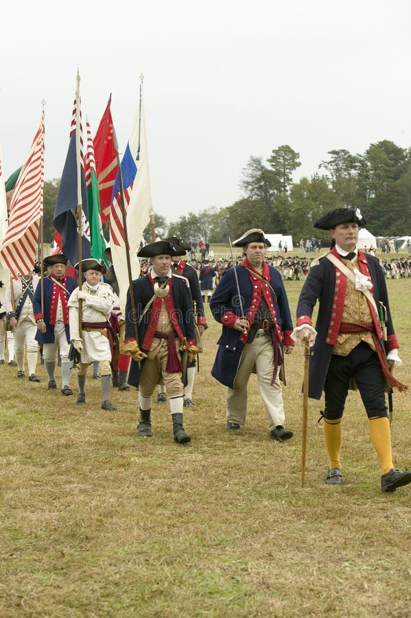 Regimental flag procession at the 225th Anniversary of the Victory at Yorktown, a reenactment of the siege of Yorktown, where General George Washington commanded 17,600 American troops and French Comte de Rochambeau lead 5500 French troops, together defea. Regimental flag procession at the 225th Anniversary of the Victory at Yorktown, a reenactment of the siege of Yorktown, where General George Washington commanded 17,600 American troops and French Comte de Rochambeau lead 5500 French troops, together defea