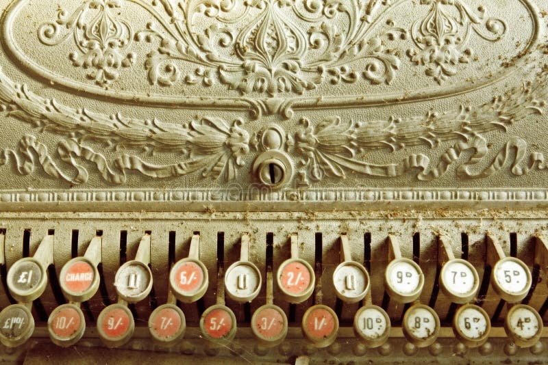 Vintage cash register, covered in dust and cobwebs. Antique pounds, shillings and pence register. Vintage cash register, covered in dust and cobwebs. Antique pounds, shillings and pence register.