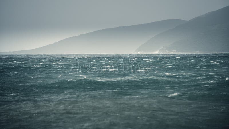 Rain over the stormy sea, abstract dark background. Rain over the stormy sea, abstract dark background.