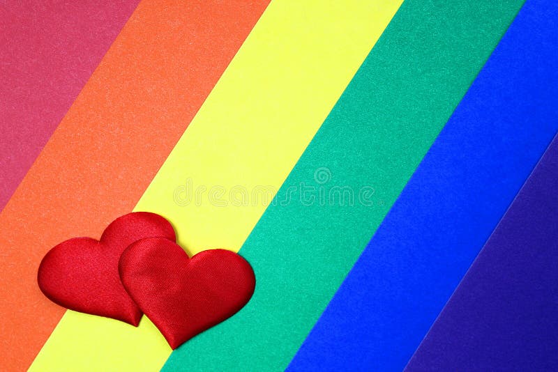 Regnbåge homosexuell bakgrund med röda hjärtan