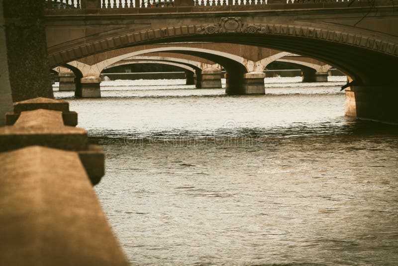 A row of bridges in downtown Des Moines Iowa. A row of bridges in downtown Des Moines Iowa