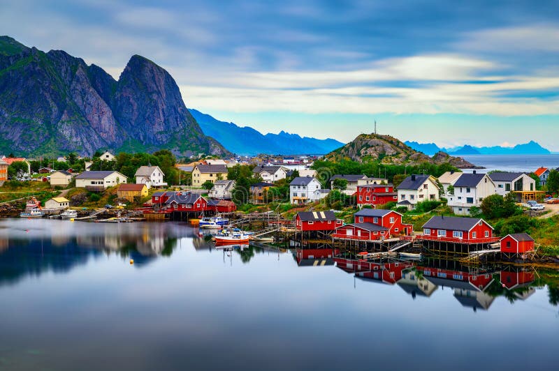 Reine village with red rorbu cottages and mountains on Lofoten islands, Norway