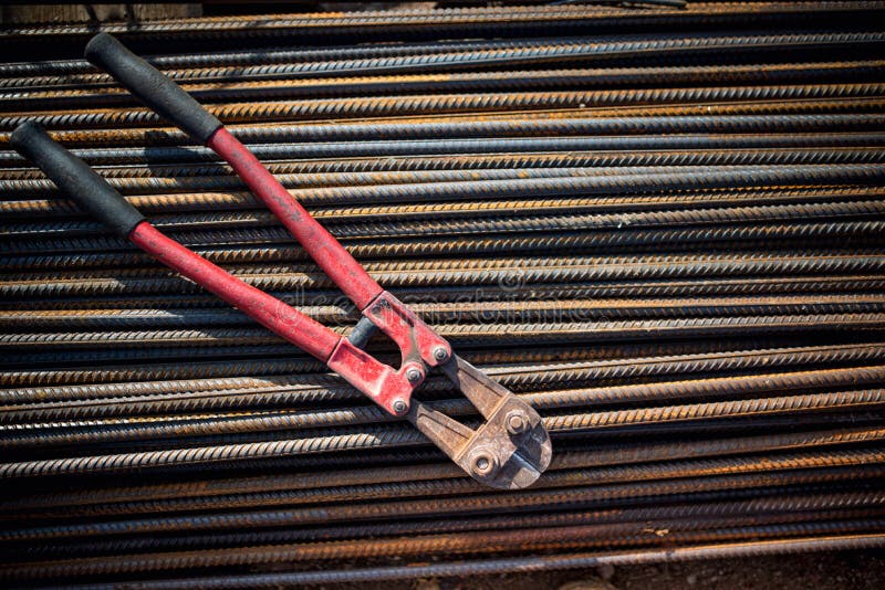 Reinforced steel bars and bolt cutter on building construction site