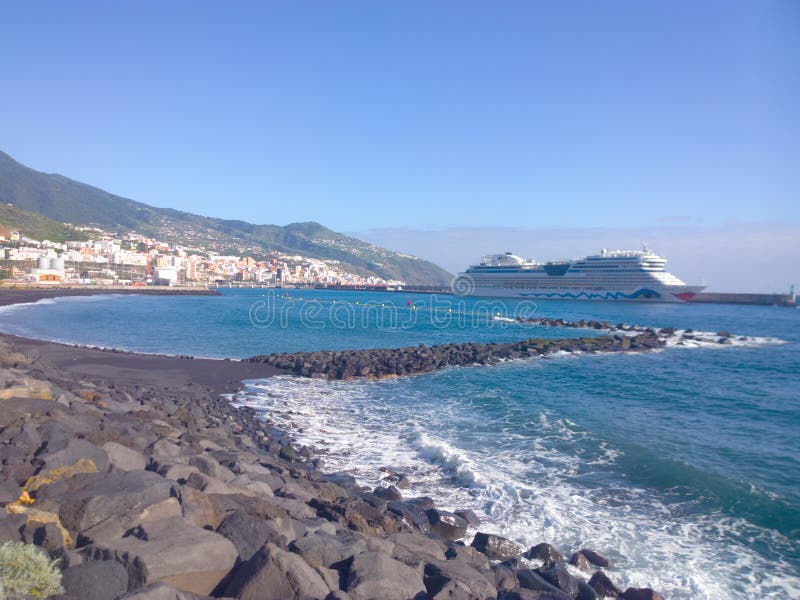 One cruise ships docked at the pier in front of the beach. One cruise ships docked at the pier in front of the beach