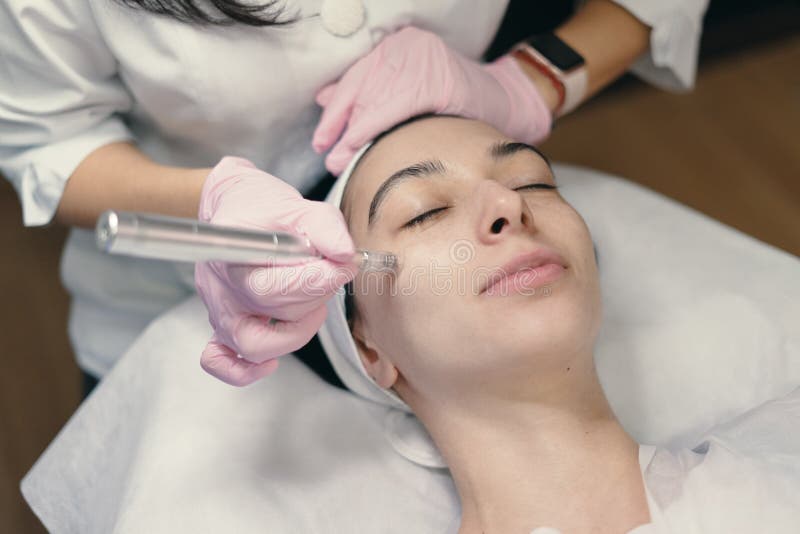 Rejuvenating Facial Treatment Model Getting Lifting Therapy Massage In A Beauty Spa Salon Stock