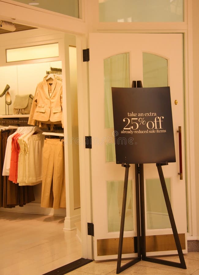 It is a picture about 25% discount sign at the fashion cloth store. It is a picture about 25% discount sign at the fashion cloth store.