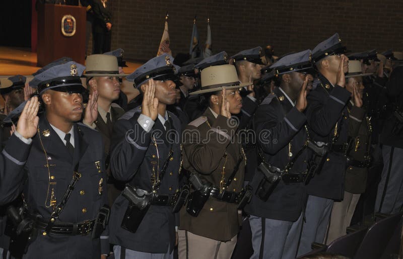 Some of the 59 Prince George`s County Police recruits sworn in during a graduation ceremony in Greenbelt, Md. Some of the 59 Prince George`s County Police recruits sworn in during a graduation ceremony in Greenbelt, Md