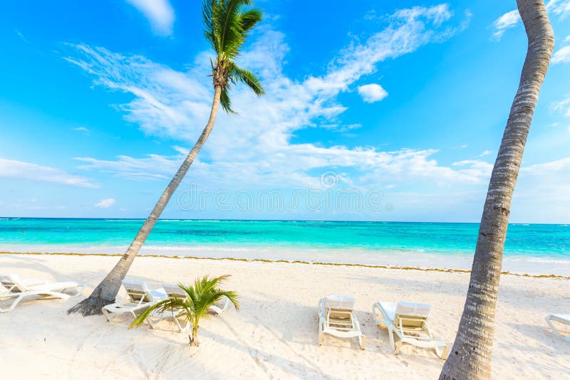 Relaxing on sun lounger at Akumal Beach - Riviera Maya - paradise beaches at Cancun, Quintana Roo, Mexico - Caribbean coast - tropical destination for vacation. Relaxing on sun lounger at Akumal Beach - Riviera Maya - paradise beaches at Cancun, Quintana Roo, Mexico - Caribbean coast - tropical destination for vacation