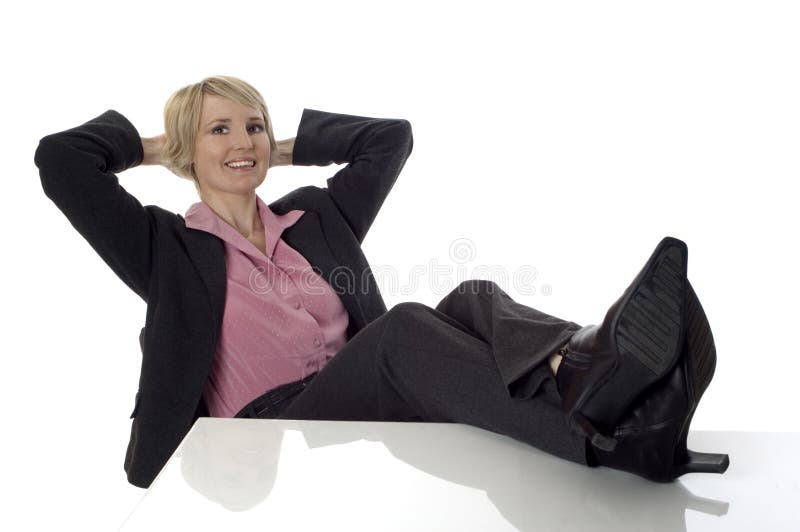 Young business women sitting and relaxing on white