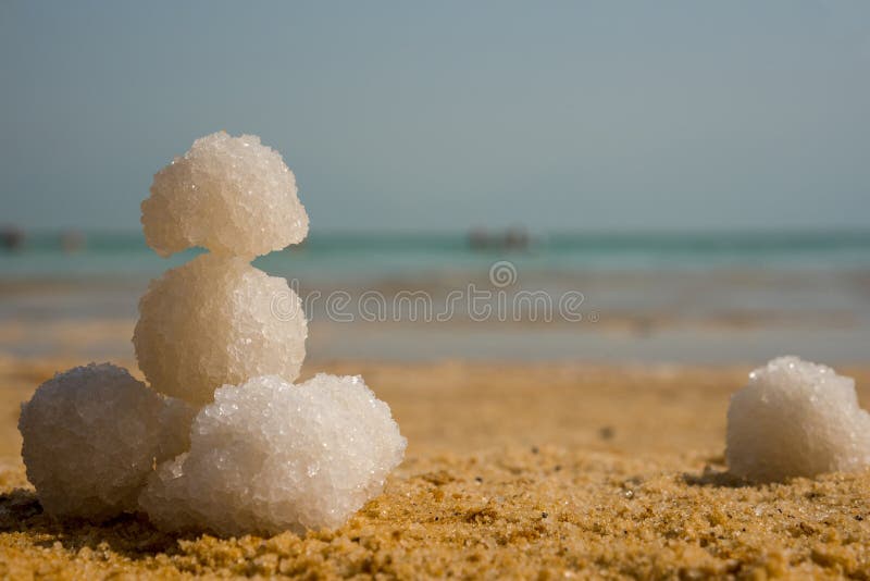Relax Balls of Salt on the Sand. Sky Horizon. Sea Stock Photo Image