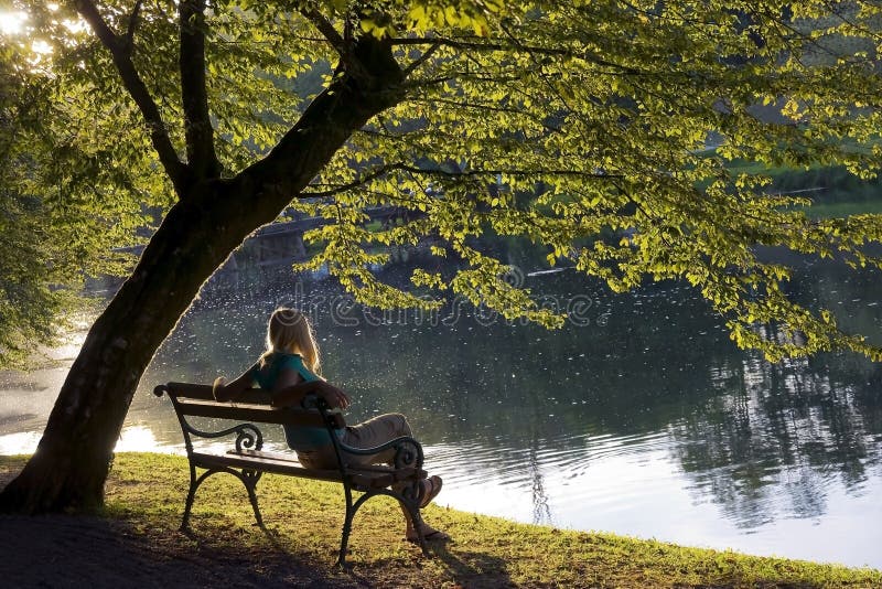 Woman Reading Book on Bench Stock Image - Image of serenity, girl: 10689