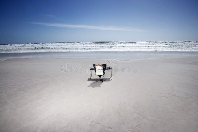 Relaxed Businessman On Beach