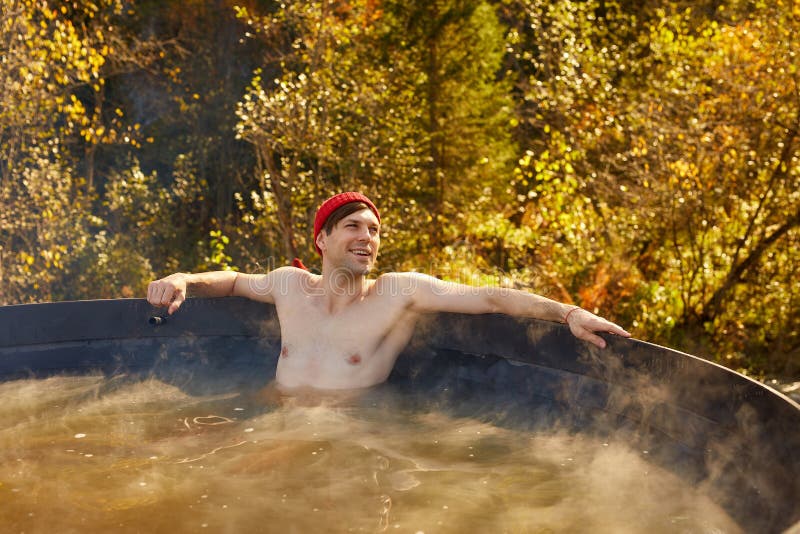Relaxed Male Relaxing in Hot Tub Outdoor Stock Photo - Image
