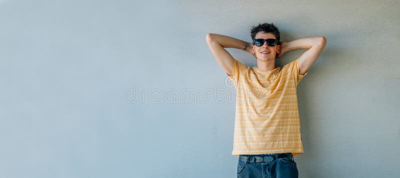 Relaxed Teen Boy in Sunglasses Stock Image - Image of male