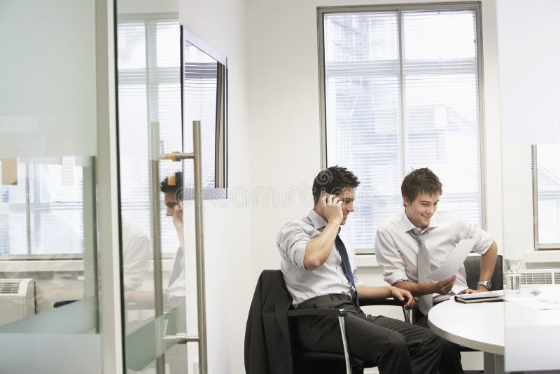 Relaxed Young Businessmen In Casual Meeting