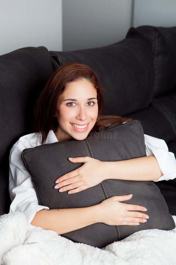 Relaxed Young Girl Hugging Cushion Stock Photos Free & RoyaltyFree