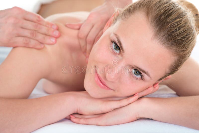 Relaxed young woman getting a spa treatment