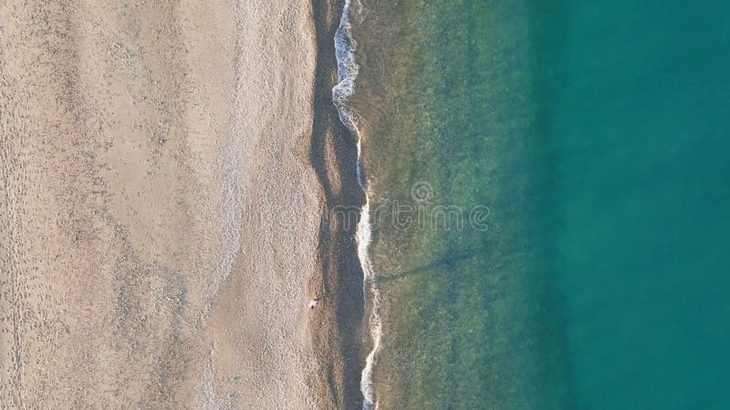 Relaxing calm ocean waves on sandy Beach stock video footage